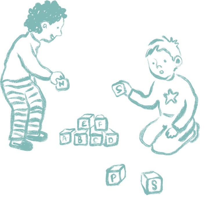 Two children playing with alphabet blocks.